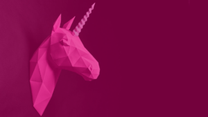 Pink unicorn on a pink background depicting Building Confidence and Leadership Skills for Personal Growth